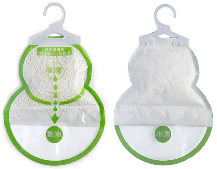 Beg pakaian penyerap kelembapan kering dengan penyangkut mengenai dehumidifier .jpg Dry wardrobe moisture absorber bag with hanger about dehumidifier .jpg